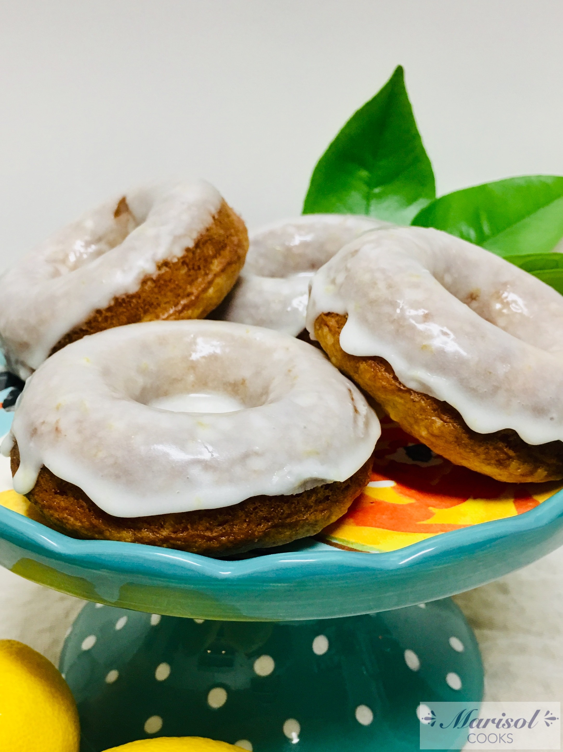 Lemon glazed sour cream baked donuts.