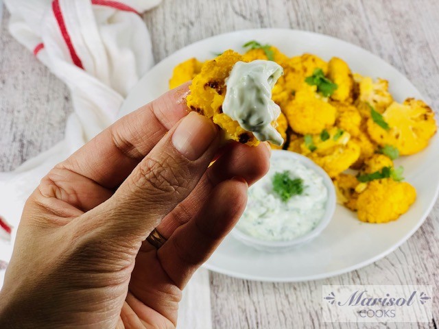 Roasted Yellow Cauliflower with Tzatziki Sauce.