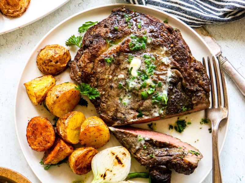Grilled Ribeye With Herb Butter and Potatoes